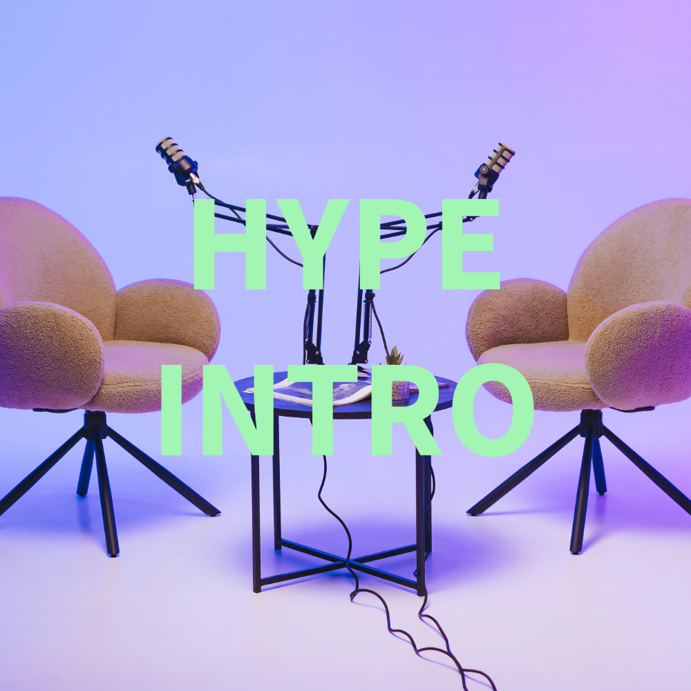 Two beige chairs face each other across a black table with two podcast microphones in a softly lit studio with HYPE INTRO text overlay.